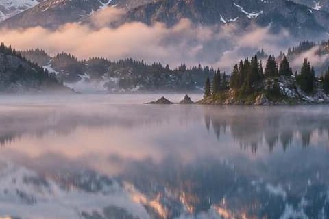 Alpine lake at sunrise, compressed to under 200 KB, at 100%